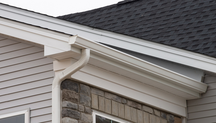 Home renovation by Horizon Exteriors in Wisconsin Rapids and Milwaukee included new white gutters and downspouts